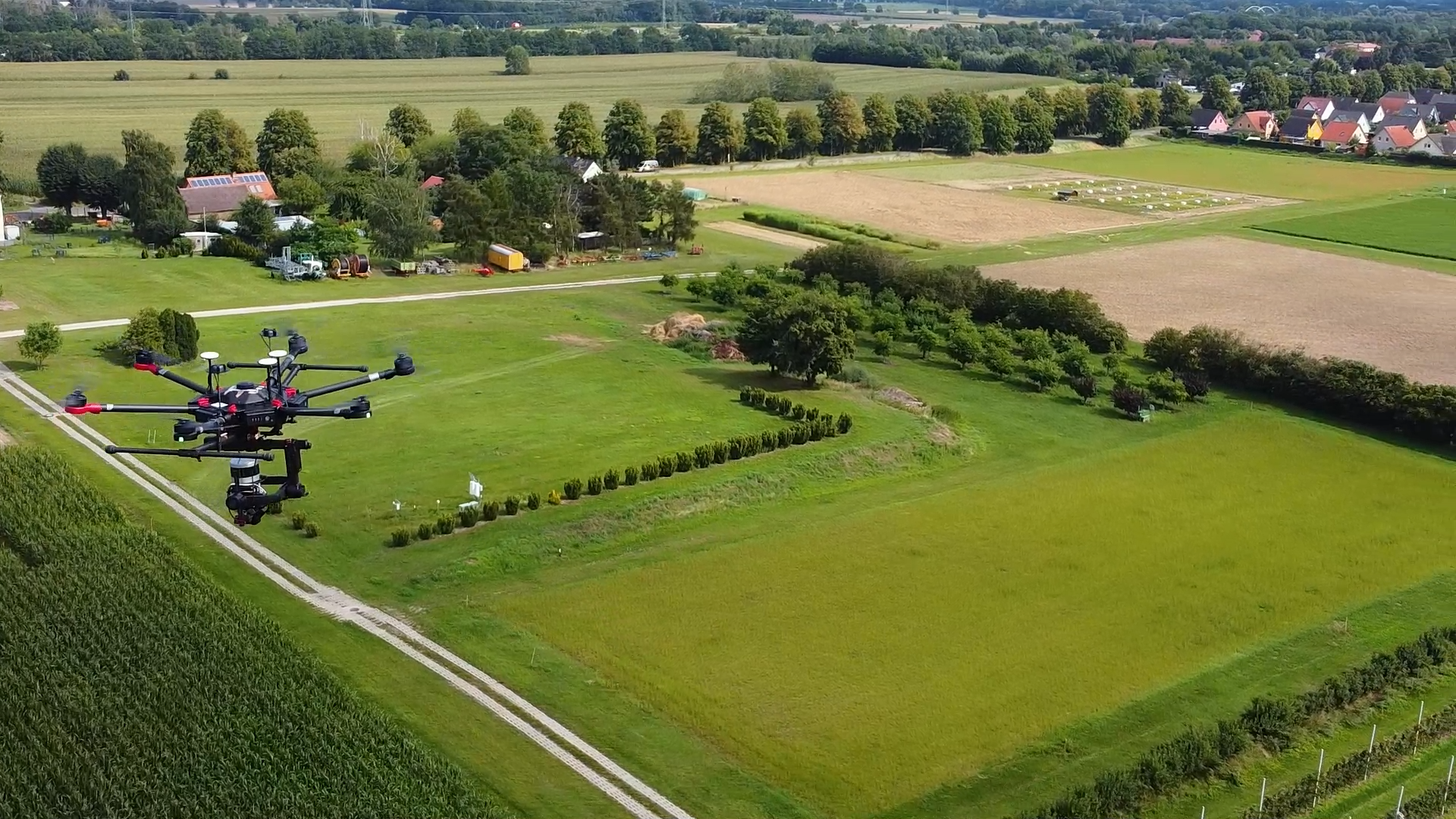 Video clip still - air-borne Photo of a drone above the research site
